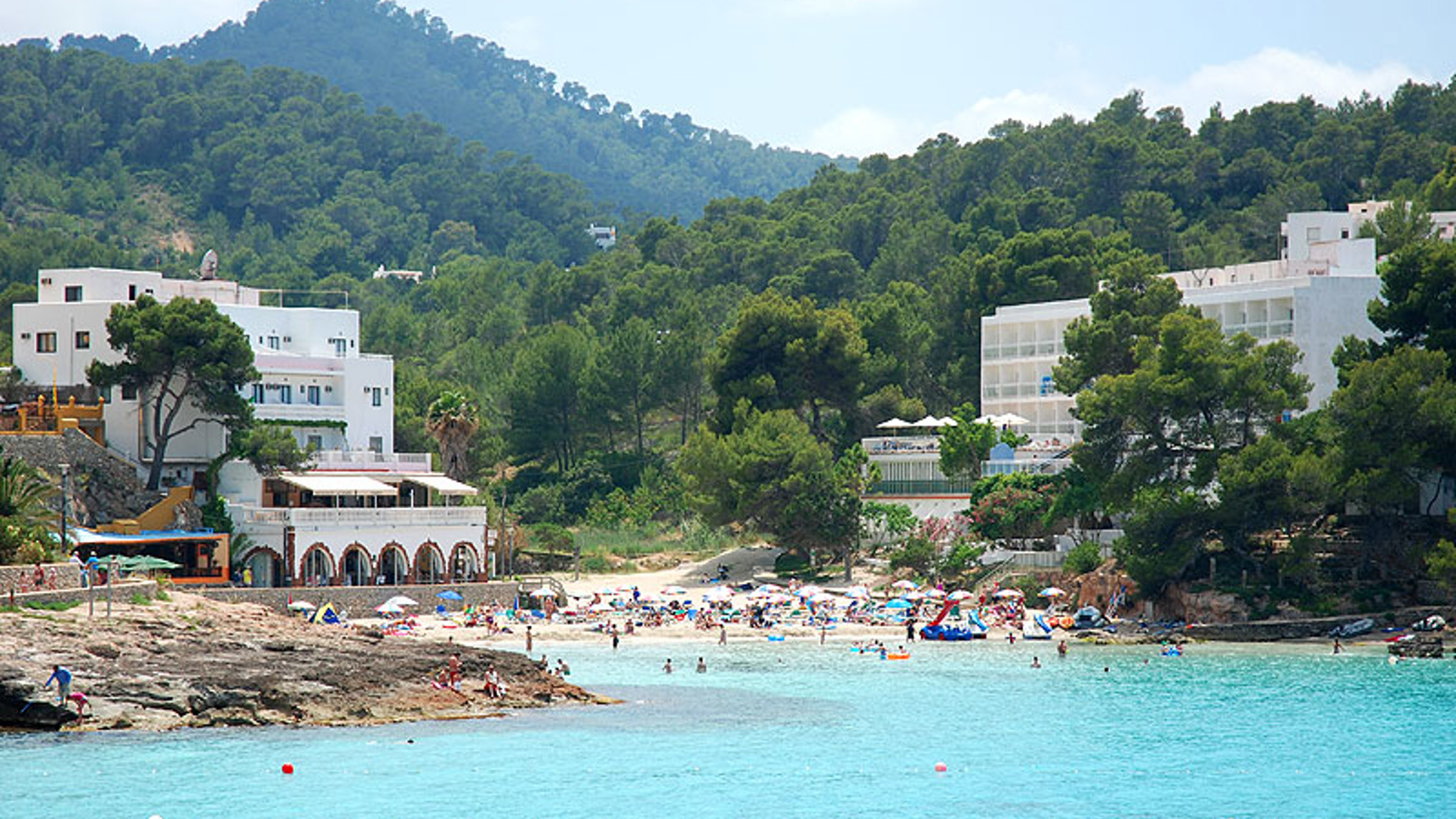 Beach In Portinaxt With People On The Beach