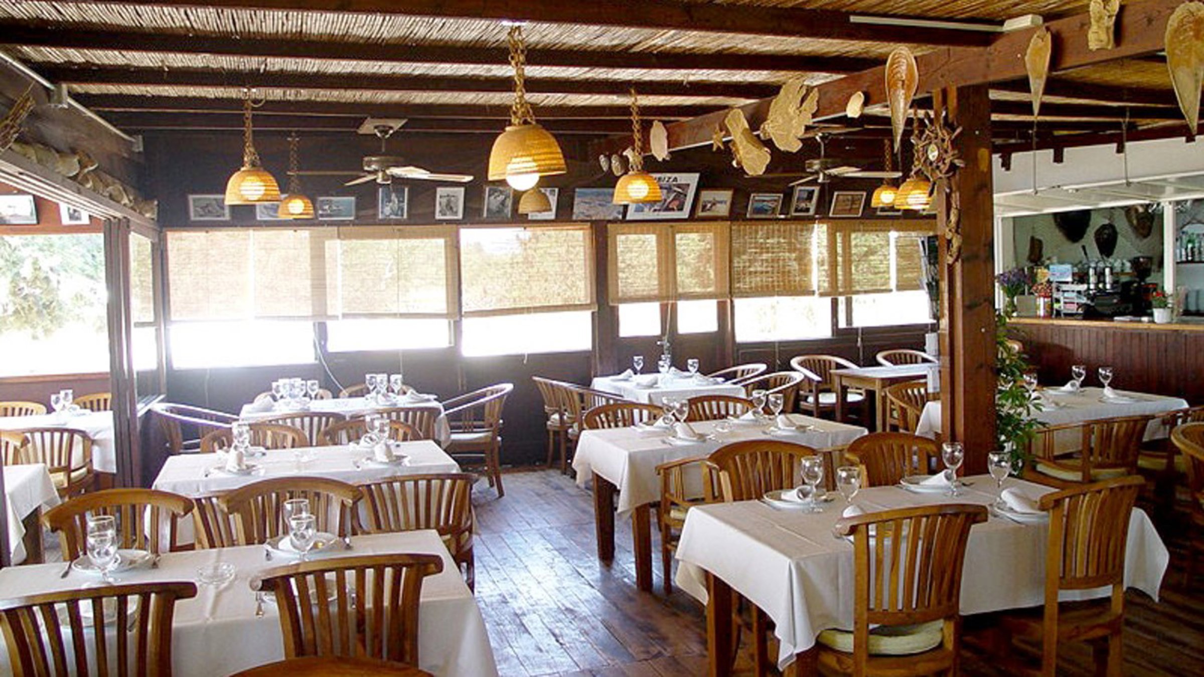 Restaurant With Chairs And Tables