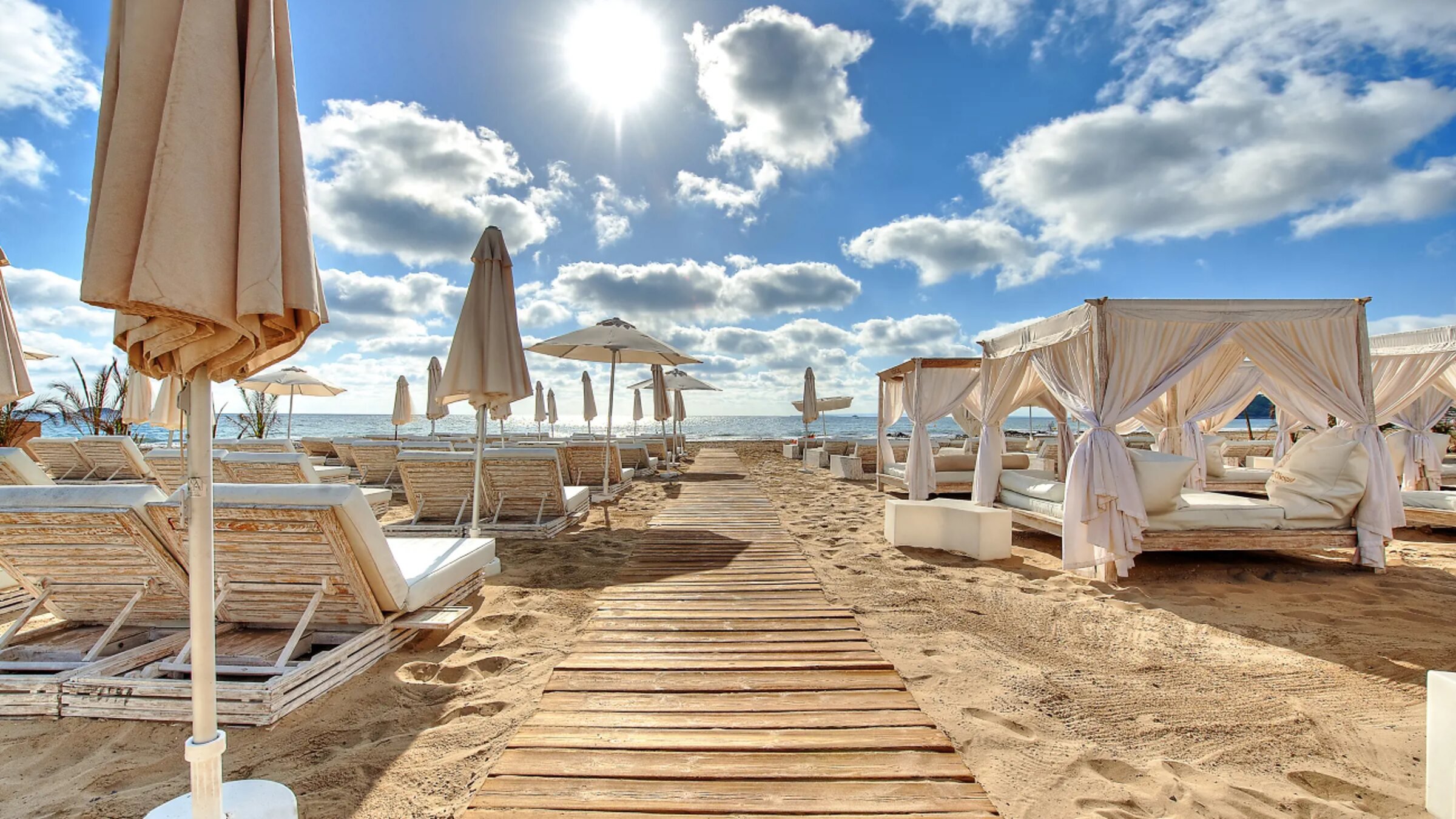 A Beach Club With Sunbeds On A Sunny Day (2)