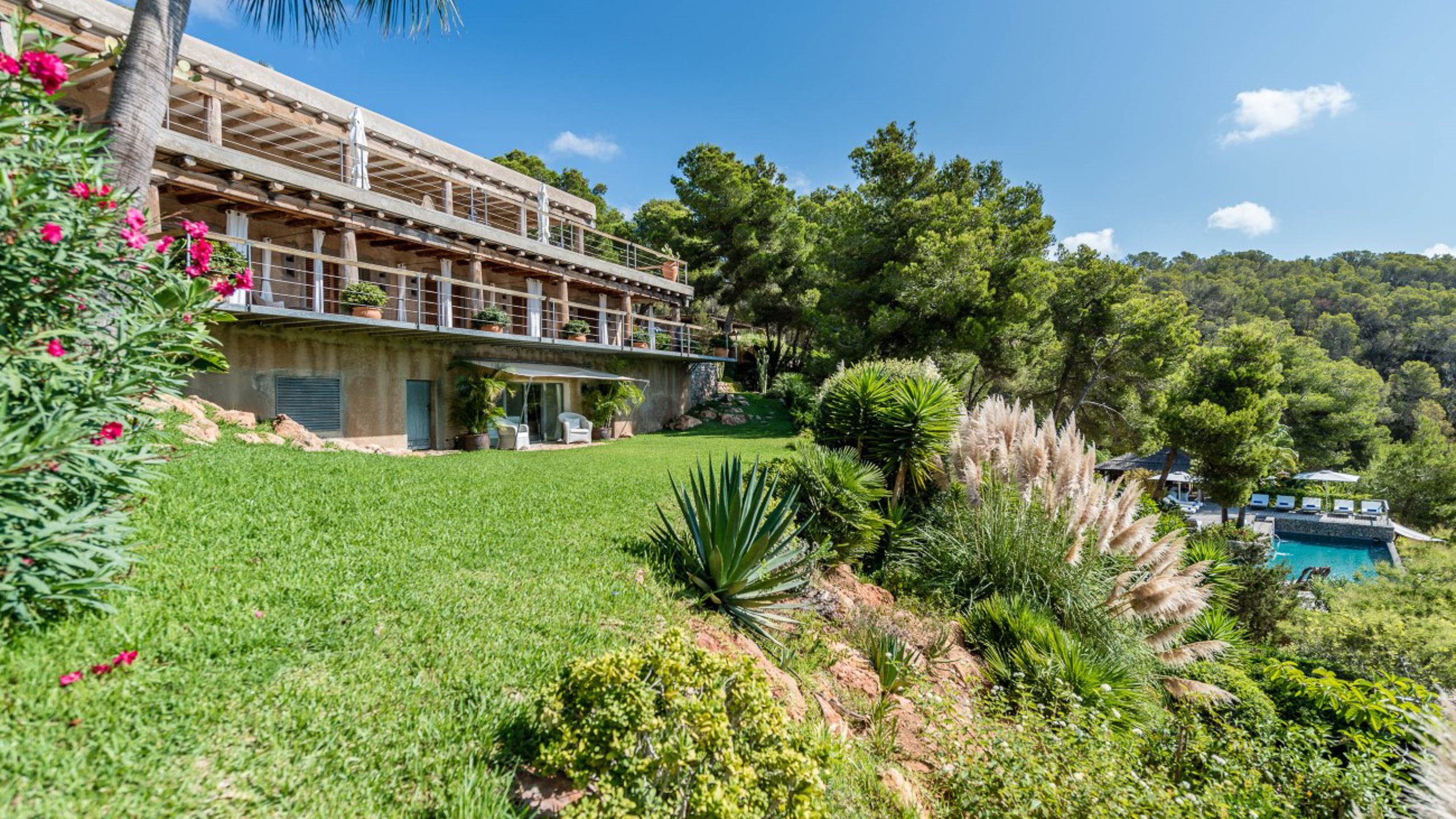 Front Side Of Luxury Villa With Pool And Garden