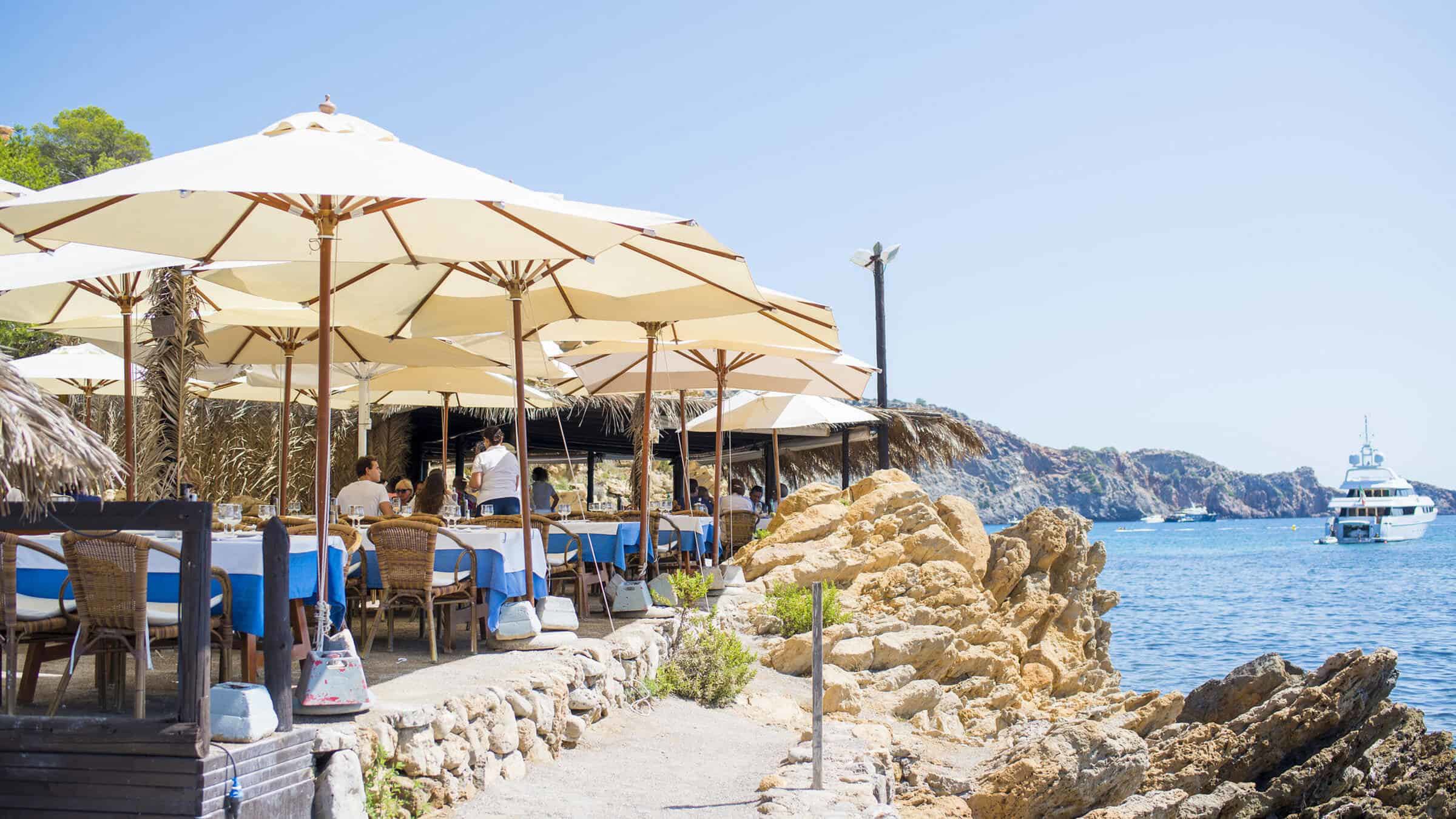 People Seating By The Sea At The Terrace (1)