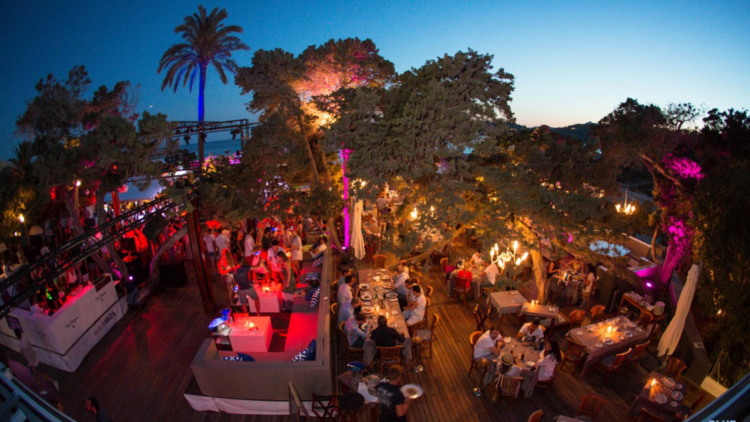 Beach Club At Night With People Around