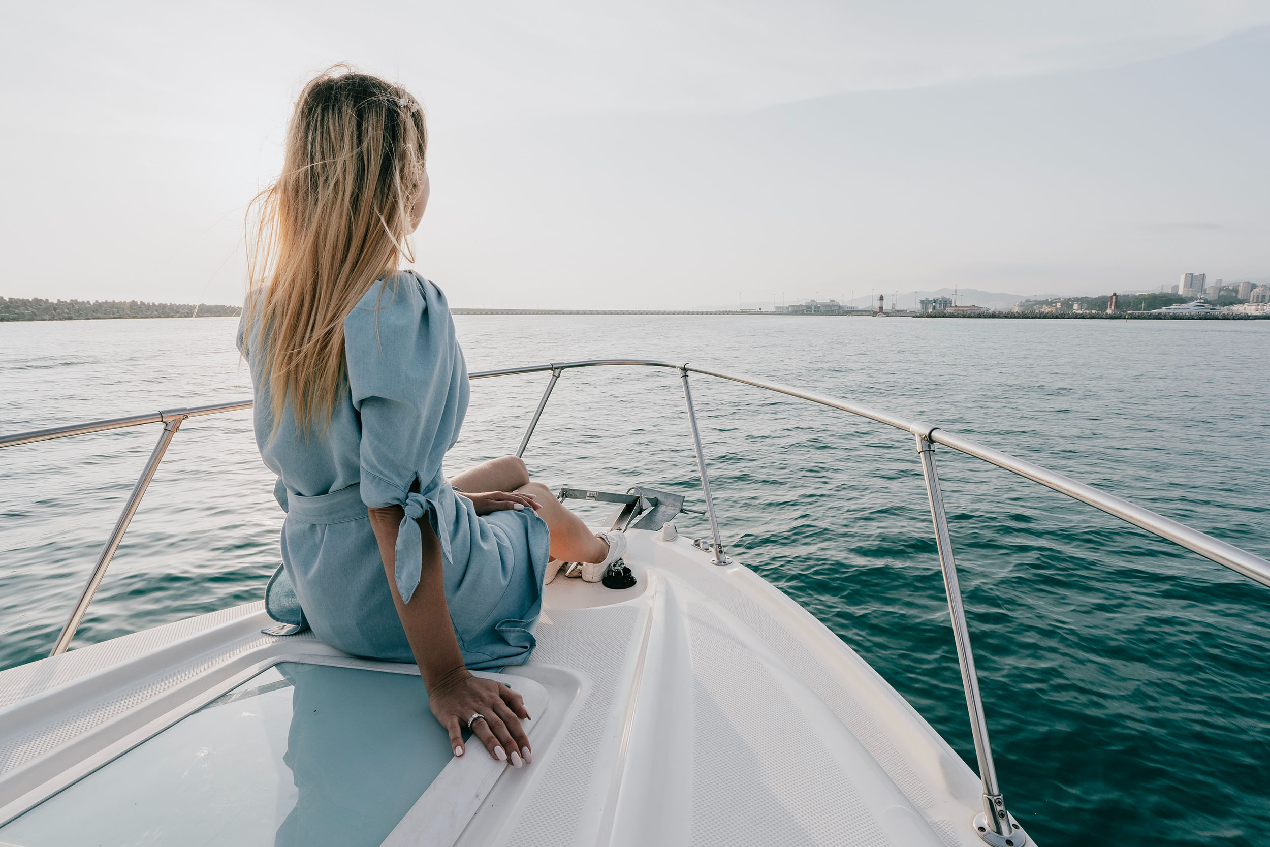 Dynamic Lives Concierge Woman Sat On Front Speedboat Dmitry Tomashek